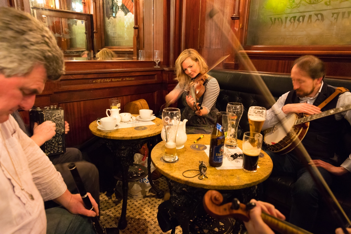 Local musicians playing traditional music in The Garrick, a pub in Belfast, Northern Ireland